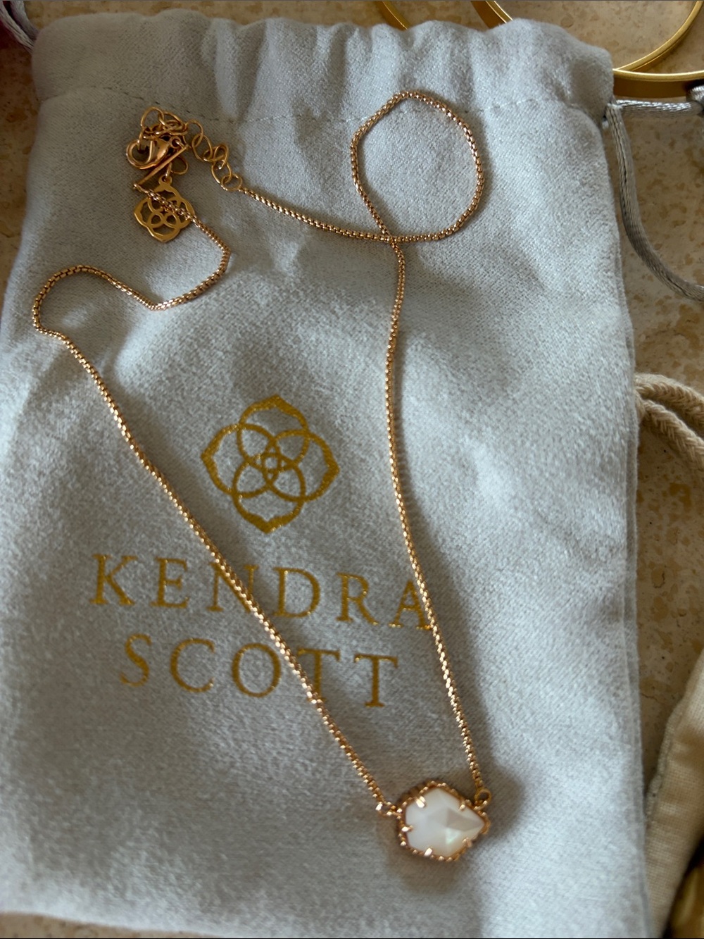 Kendra Scott Gold Necklace with White Pendant